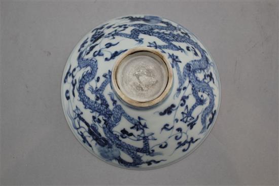 A Chinese blue and white dragon and phoenix bowl, Yongle four character mark to the interior, 15cm.